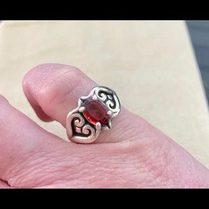 James Avery sz.5 scrolled heart ring with garnet.